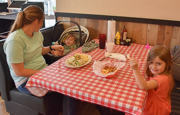 A family having lunch together at Sarasota Grill & Pizzeria in Sarasota